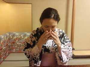 Enjoying green tea in a yukata (summer kimono)